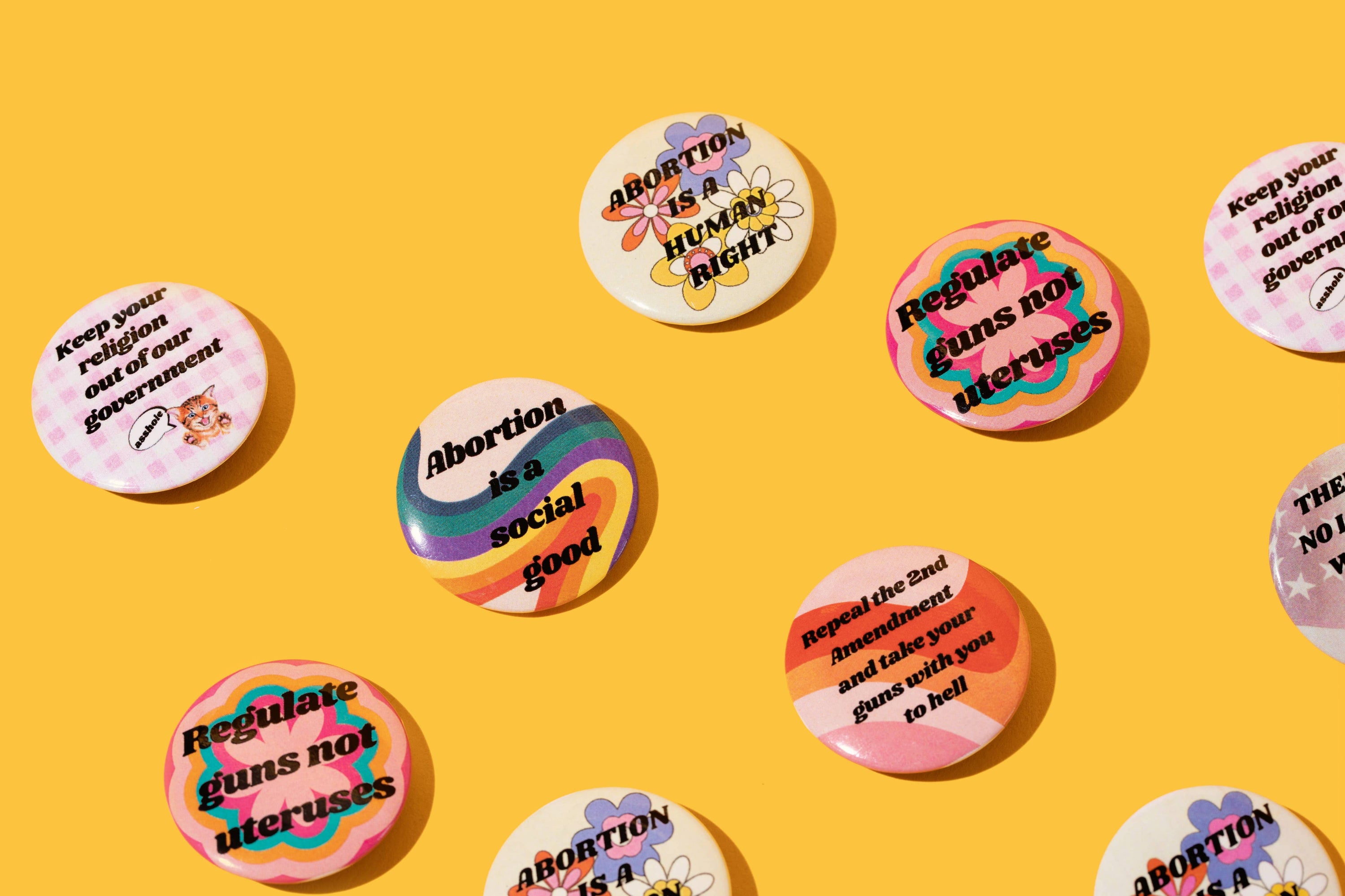 Regulate Guns Not Uteruses Pro-Choice Feminist Button